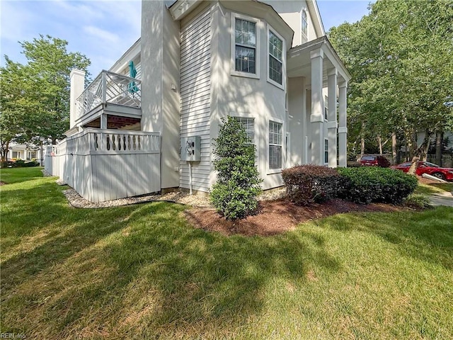 563 Seahorse Run, Chesapeake, VA 23320 - view of property exterior featuring a balcony and a lawn