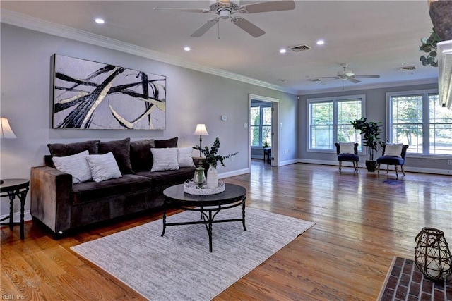 66 Heron Harbor Way, Hudgins, VA 23076 - living area with ceiling fan, crown molding, wood finished floors, and recessed lighting