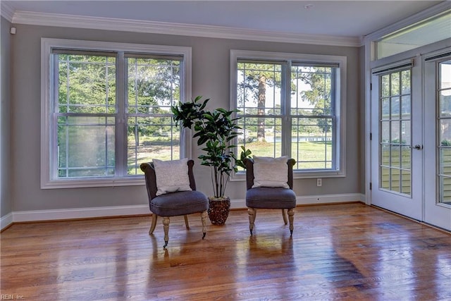 66 Heron Harbor Way, Hudgins, VA 23076 - sitting room with wood finished floors, crown molding, and french doors