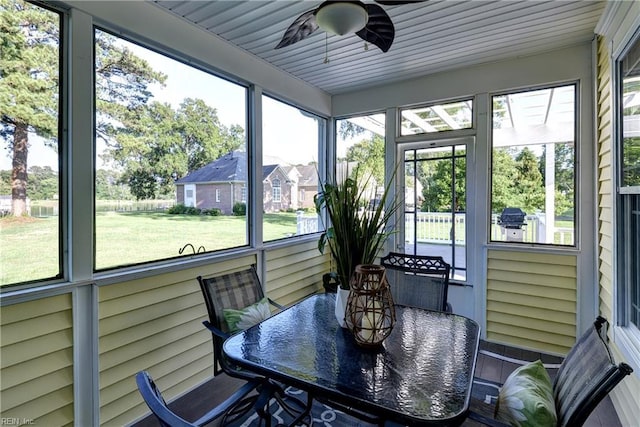 66 Heron Harbor Way, Hudgins, VA 23076 - sunroom / solarium with ceiling fan and outdoor dining area