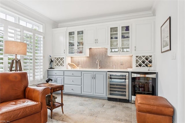 2841 Bennetts Pond Rd, Williamsburg, VA 23185 - indoor wet bar featuring beverage cooler, tasteful backsplash, and ornamental molding