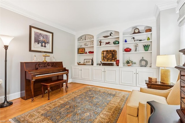 2841 Bennetts Pond Rd, Williamsburg, VA 23185 - living area with light wood-style flooring, ornamental molding, and built in shelves