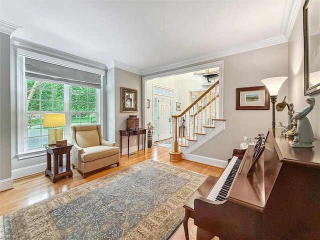 2841 Bennetts Pond Rd, Williamsburg, VA 23185 - living room featuring wood finished floors, ornamental molding, and stairs