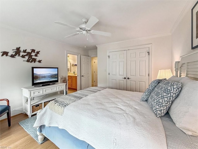 2841 Bennetts Pond Rd, Williamsburg, VA 23185 - bedroom with light wood finished floors, ornamental molding, a ceiling fan, a closet, and ensuite bathroom