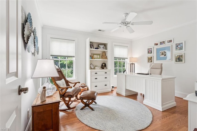 2841 Bennetts Pond Rd, Williamsburg, VA 23185 - office area with crown molding, ceiling fan, plenty of natural light, and light wood-style flooring