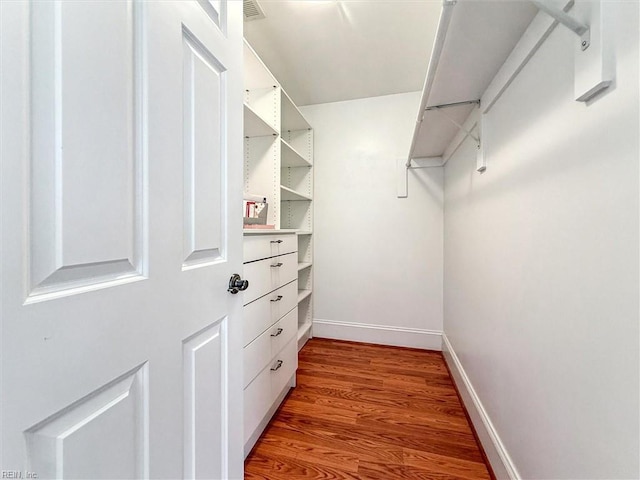 2841 Bennetts Pond Rd, Williamsburg, VA 23185 - walk in closet featuring wood finished floors