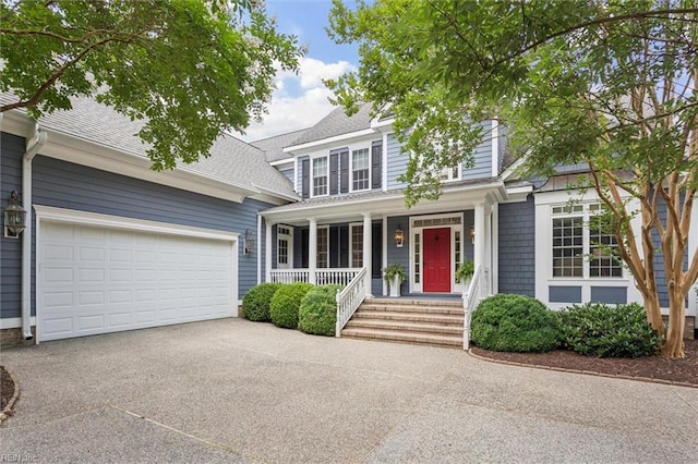 2841 Bennetts Pond Rd, Williamsburg, VA 23185 - view of front facade featuring covered porch, driveway, a garage, and roof with shingles