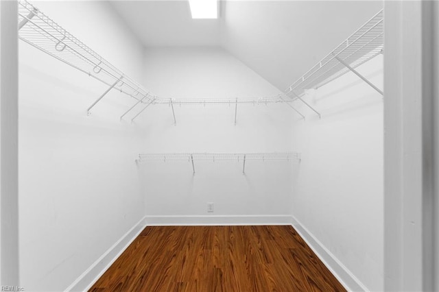 37 Winster Fax, Williamsburg, VA 23185 - walk in closet with dark wood-style flooring and lofted ceiling