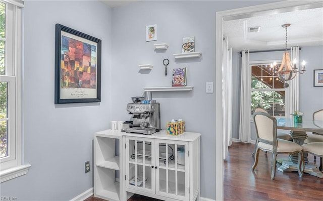 708 Inlet Quay Quay Unit D, Chesapeake, VA 23320 - dining area featuring a chandelier, wood finished floors, and a tray ceiling