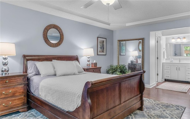 708 Inlet Quay Quay Unit D, Chesapeake, VA 23320 - bedroom featuring a textured ceiling, wood finished floors, connected bathroom, and a ceiling fan