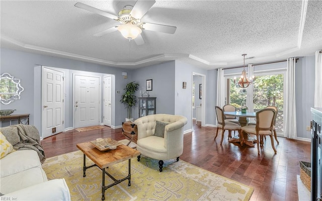 708 Inlet Quay Quay Unit D, Chesapeake, VA 23320 - living room featuring a textured ceiling, a chandelier, wood finished floors, a raised ceiling, and ceiling fan