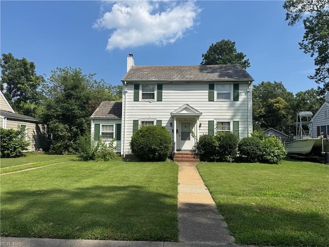 44 Milford Rd, Newport News, VA 23601 - colonial house featuring a front yard and a chimney