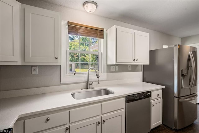 201 Jarvis Rd, Chesapeake, VA 23323 - kitchen with stainless steel appliances, light countertops, and white cabinetry