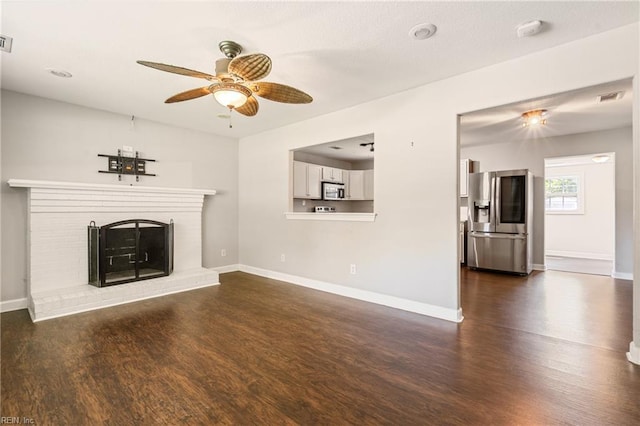 201 Jarvis Rd, Chesapeake, VA 23323 - unfurnished living room featuring a ceiling fan, dark wood finished floors, and a fireplace