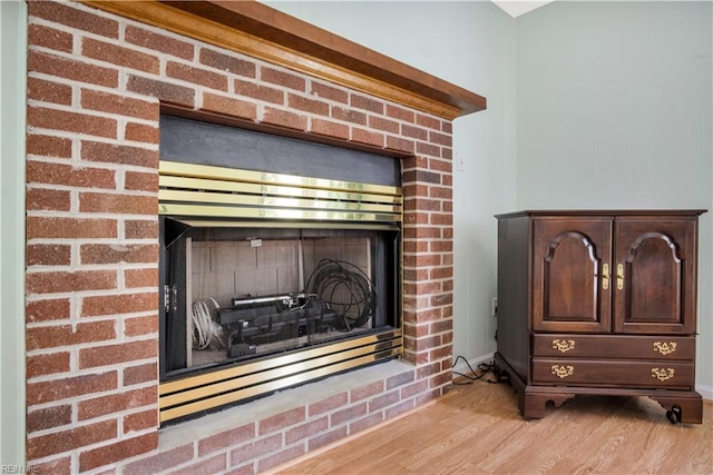 106 Deep Water Cv, Newport News, VA 23606 - detailed view of a fireplace and wood finished floors