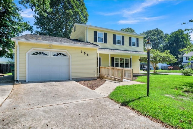 106 Deep Water Cv, Newport News, VA 23606 - traditional-style home with covered porch, a front lawn, an attached garage, and driveway