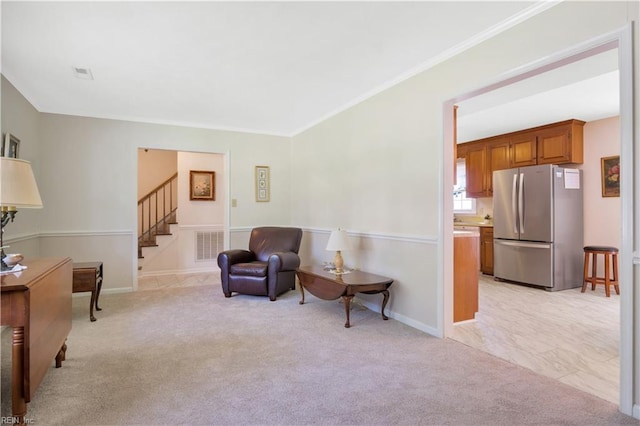 106 Deep Water Cv, Newport News, VA 23606 - living area with light colored carpet, stairs, and ornamental molding