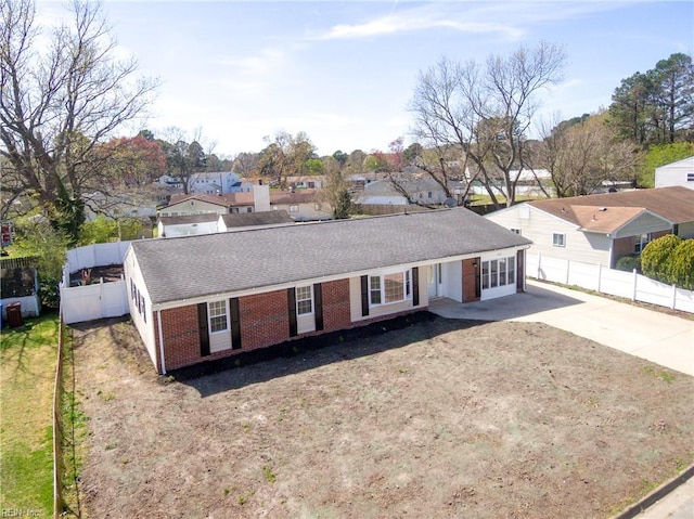 3205 Moat Ln, Chesapeake, VA 23325 - single story home with driveway, brick siding, a shingled roof, and a residential view