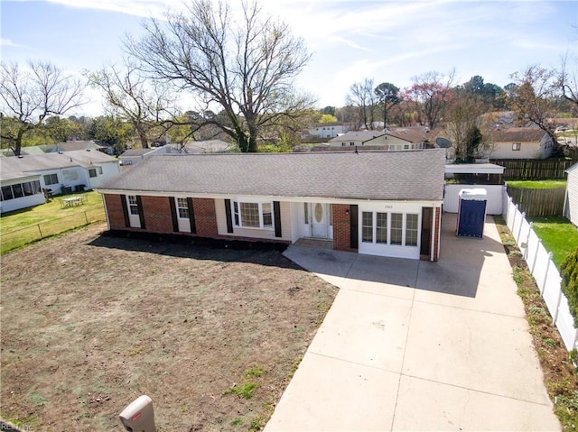 3205 Moat Ln, Chesapeake, VA 23325 - ranch-style home with driveway, brick siding, a residential view, and a shingled roof