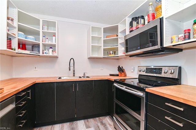 2813 Squire Ct, Chesapeake, VA 23323 - kitchen with wood counters, appliances with stainless steel finishes, dark cabinets, and open shelves
