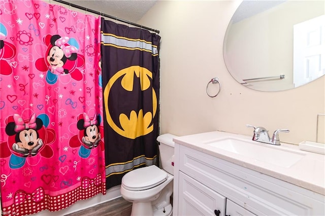2813 Squire Ct, Chesapeake, VA 23323 - bathroom with vanity, wood finished floors, and a textured ceiling