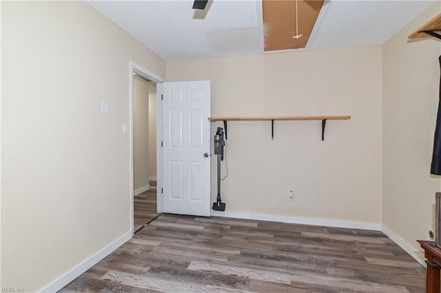 2813 Squire Ct, Chesapeake, VA 23323 - unfurnished room with wood finished floors and attic access