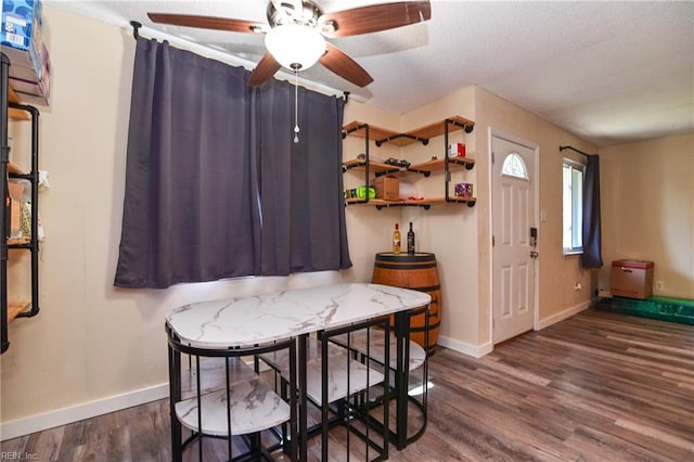 2813 Squire Ct, Chesapeake, VA 23323 - dining space featuring wood finished floors, a ceiling fan, and a textured ceiling