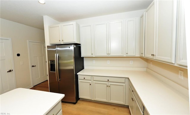 1604 Redwing Arch, Chesapeake, VA 23323 - kitchen featuring stainless steel fridge with ice dispenser, light countertops, and light wood finished floors