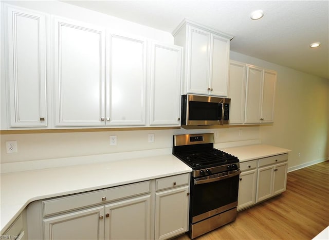 1604 Redwing Arch, Chesapeake, VA 23323 - kitchen featuring stainless steel appliances, light wood-style flooring, recessed lighting, and light countertops