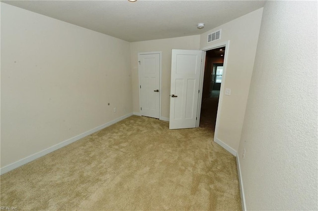 1604 Redwing Arch, Chesapeake, VA 23323 - empty room featuring light carpet and baseboards