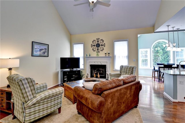 2712 Holly Ridge Ln, Williamsburg, VA 23185 - living area with ceiling fan, a high end fireplace, light wood-type flooring, and high vaulted ceiling