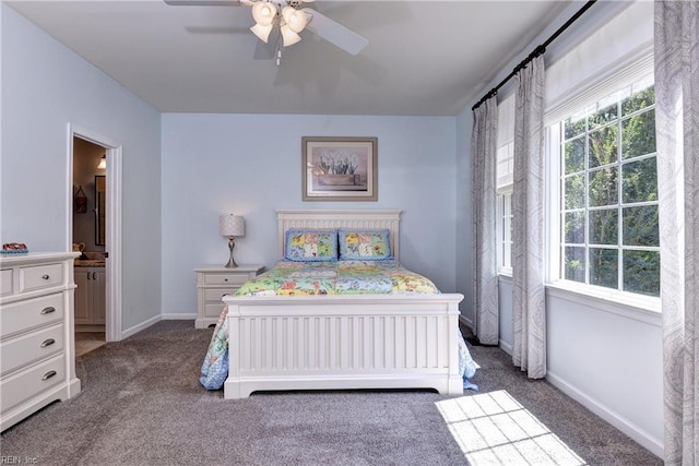 2712 Holly Ridge Ln, Williamsburg, VA 23185 - carpeted bedroom featuring connected bathroom and ceiling fan