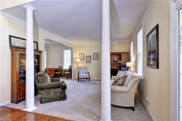 2712 Holly Ridge Ln, Williamsburg, VA 23185 - living area with decorative columns, crown molding, a fireplace, and wood finished floors
