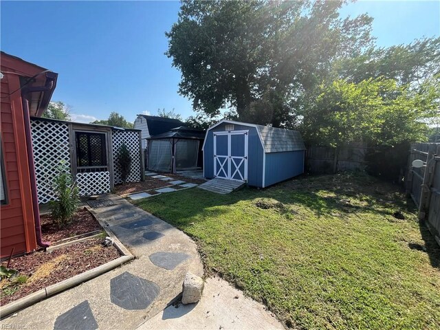 639 Fairfield Blvd, Hampton, VA 23669 - fenced backyard with a storage shed