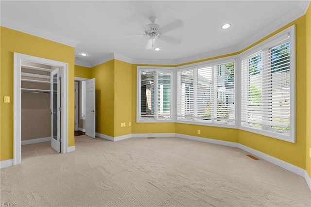308 Rivers Edge, Williamsburg, VA 23185 - unfurnished bedroom with crown molding, carpet, a spacious closet, recessed lighting, and a ceiling fan