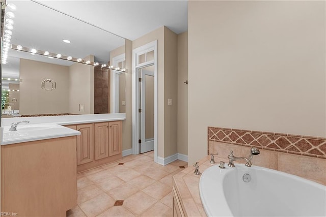 308 Rivers Edge, Williamsburg, VA 23185 - full bath featuring vanity, a garden tub, and tile patterned flooring