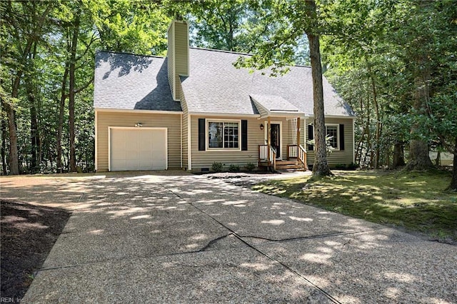 4505 Wimbledon Way, Williamsburg, VA 23188 - view of front of house featuring a garage, driveway, a chimney, crawl space, and a shingled roof
