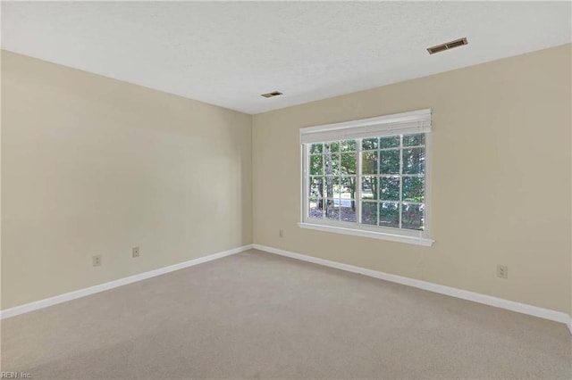 4505 Wimbledon Way, Williamsburg, VA 23188 - carpeted spare room featuring baseboards