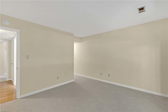 4505 Wimbledon Way, Williamsburg, VA 23188 - spare room featuring light carpet and a smoke detector