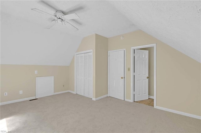 4505 Wimbledon Way, Williamsburg, VA 23188 - bonus room featuring carpet floors, a ceiling fan, a textured ceiling, and vaulted ceiling