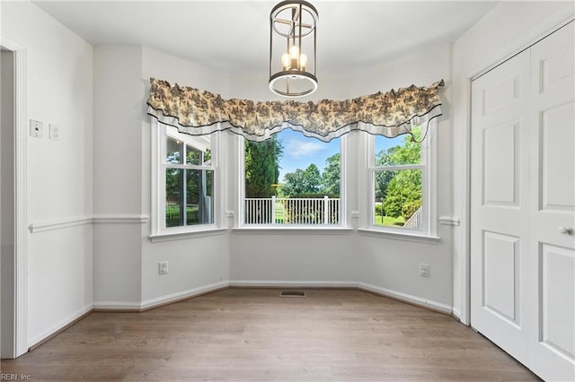60 Dillwyn Dr, Newport News, VA 23602 - unfurnished dining area featuring wood finished floors and baseboards
