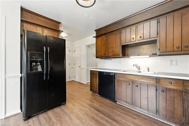 60 Dillwyn Dr, Newport News, VA 23602 - kitchen with black appliances, light wood-type flooring, open shelves, and light countertops
