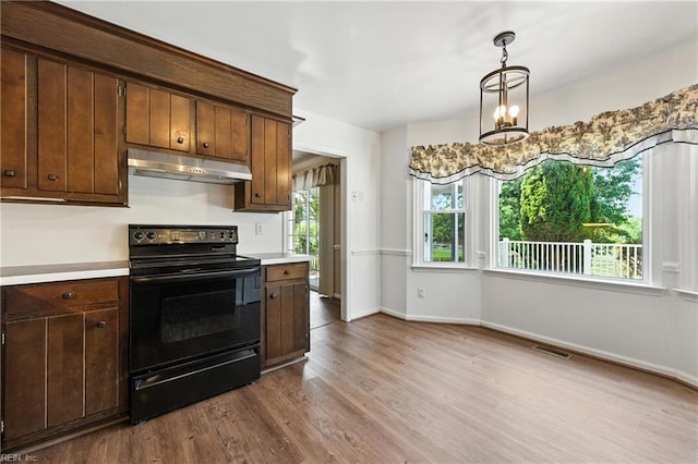 60 Dillwyn Dr, Newport News, VA 23602 - kitchen featuring electric range, under cabinet range hood, dark wood finished floors, and light countertops