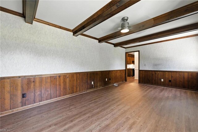 60 Dillwyn Dr, Newport News, VA 23602 - unfurnished room featuring beamed ceiling, wood finished floors, ceiling fan, a wainscoted wall, and wood walls