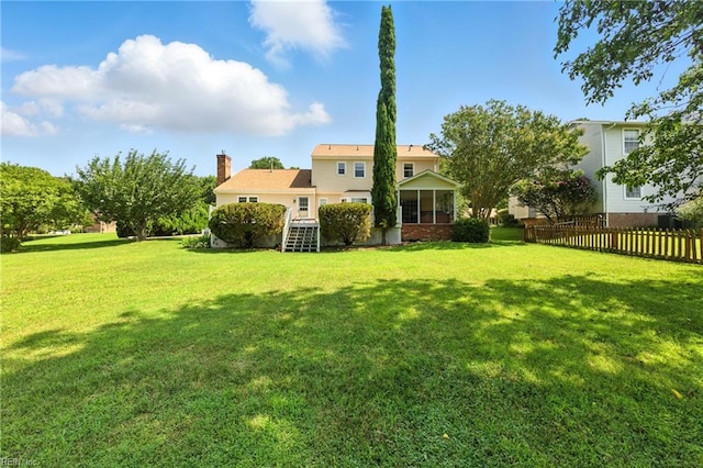 60 Dillwyn Dr, Newport News, VA 23602 - back of property with a chimney and a sunroom