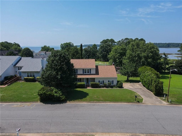 60 Dillwyn Dr, Newport News, VA 23602 - view of front facade with a front yard and a water view