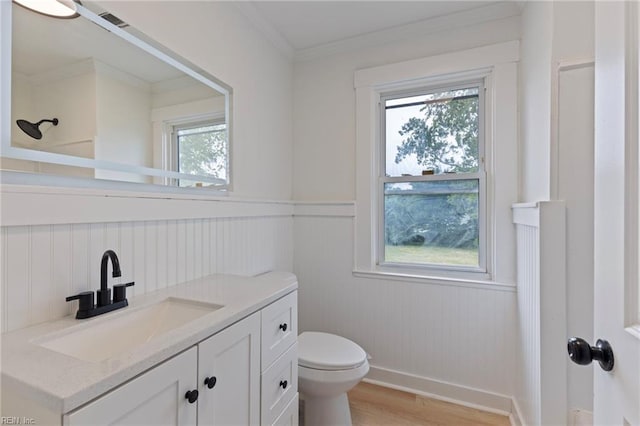 1507 Todds Ln, Hampton, VA 23666 - bathroom featuring vanity, a wainscoted wall, wood finished floors, and crown molding