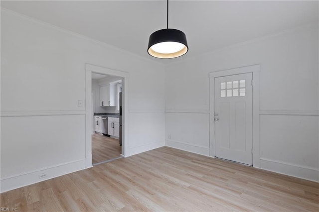 1507 Todds Ln, Hampton, VA 23666 - entryway featuring light wood-style flooring and ornamental molding