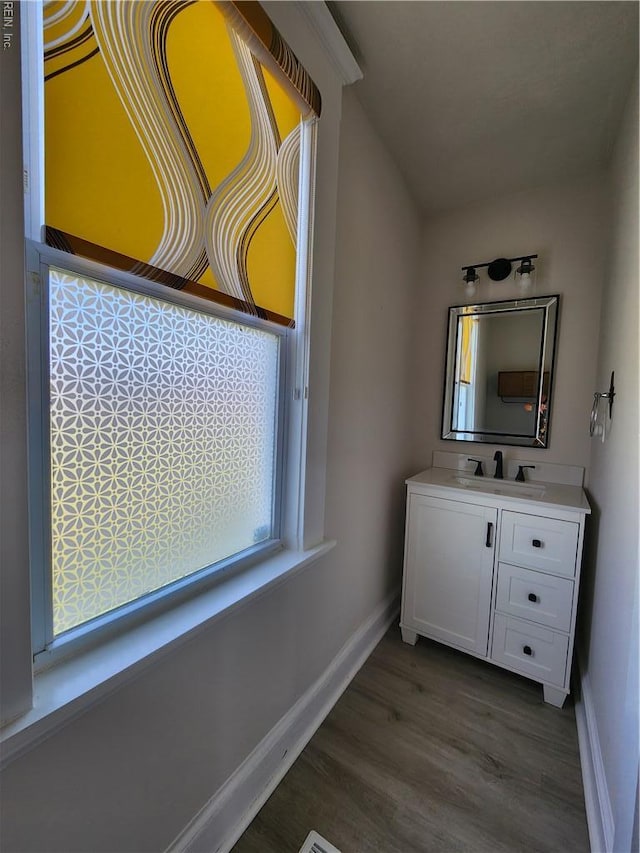 110 S Willard Ave, Hampton, VA 23663 - bathroom featuring wood finished floors and vanity