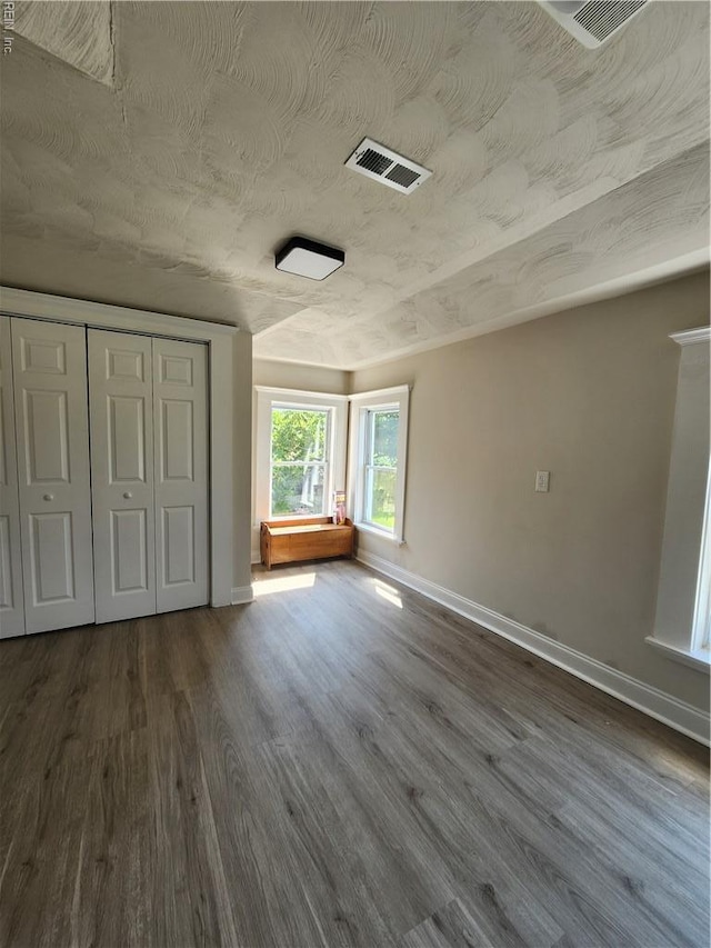 110 S Willard Ave, Hampton, VA 23663 - unfurnished bedroom featuring dark wood-style flooring and a closet